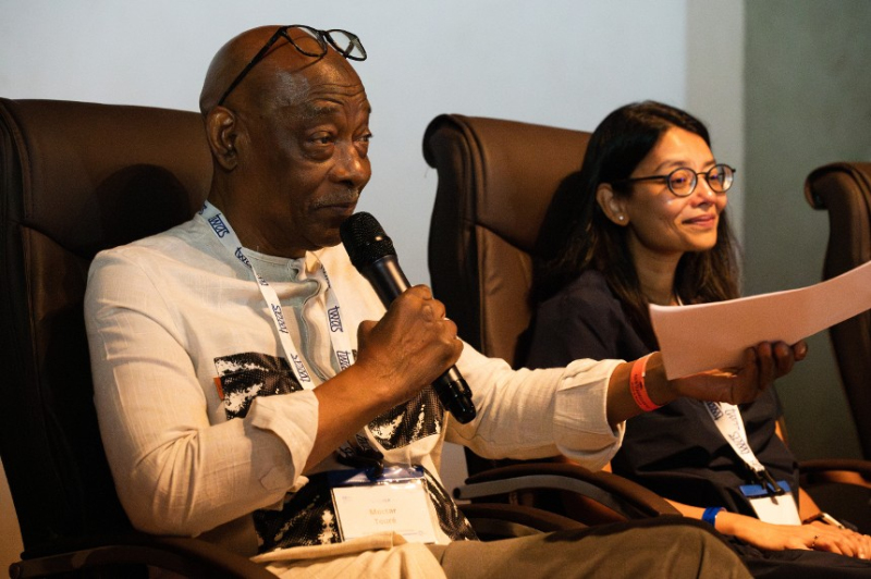 TWAS Fellow Moctar Toure, left, and TWAS Associate Programme Officer Payal Patel at the 2024 TWAS Skill Building Workshop, taking place in Dakar, Senegal, from 5-8 November 2024. [Photo: G. Ortolani/TWAS]
