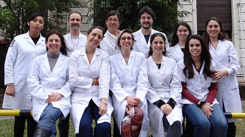 TWAS-Sida Research Grant awardee and pediatric medicine researcher Maria Victoria Preciado, bottom left, with her research group in Argentina. [Photo provided]