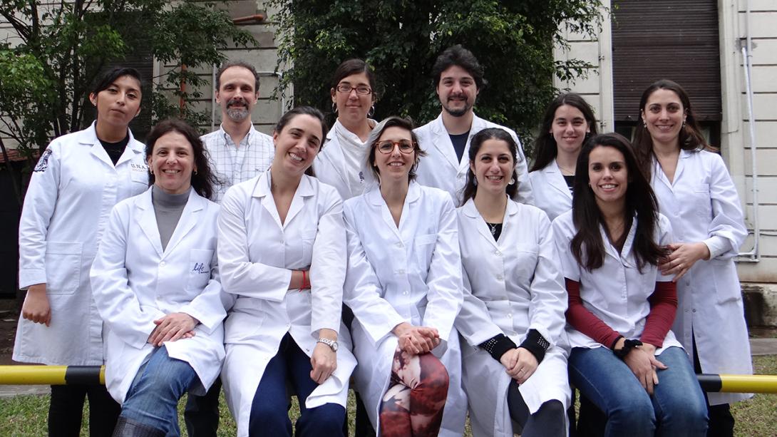 TWAS-Sida Research Grant awardee and pediatric medicine researcher Maria Victoria Preciado, bottom left, with her research group in Argentina. [Photo provided]